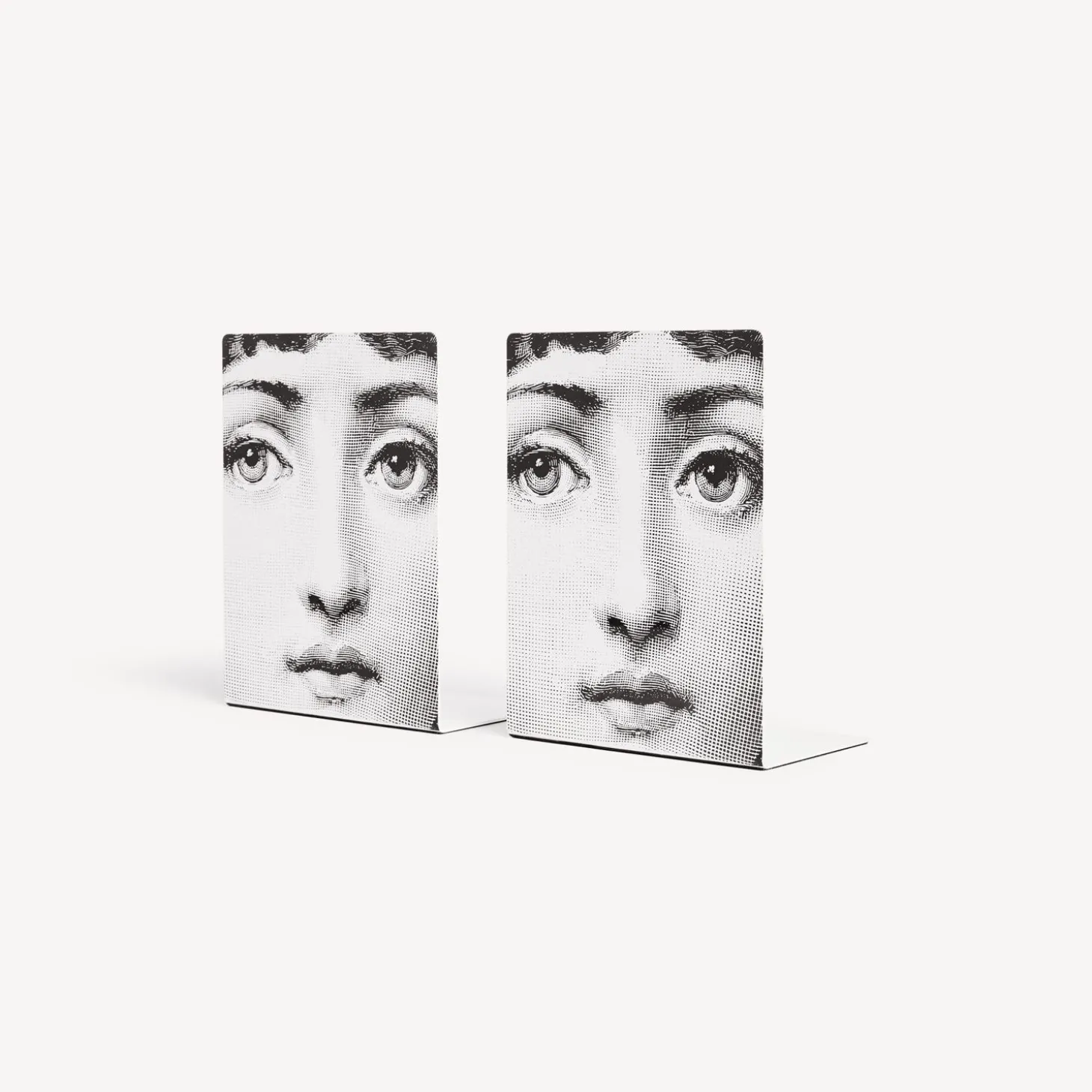 fermalibri_viso_0.webp Fornasetti Fermalibri Viso^ Fermalibri